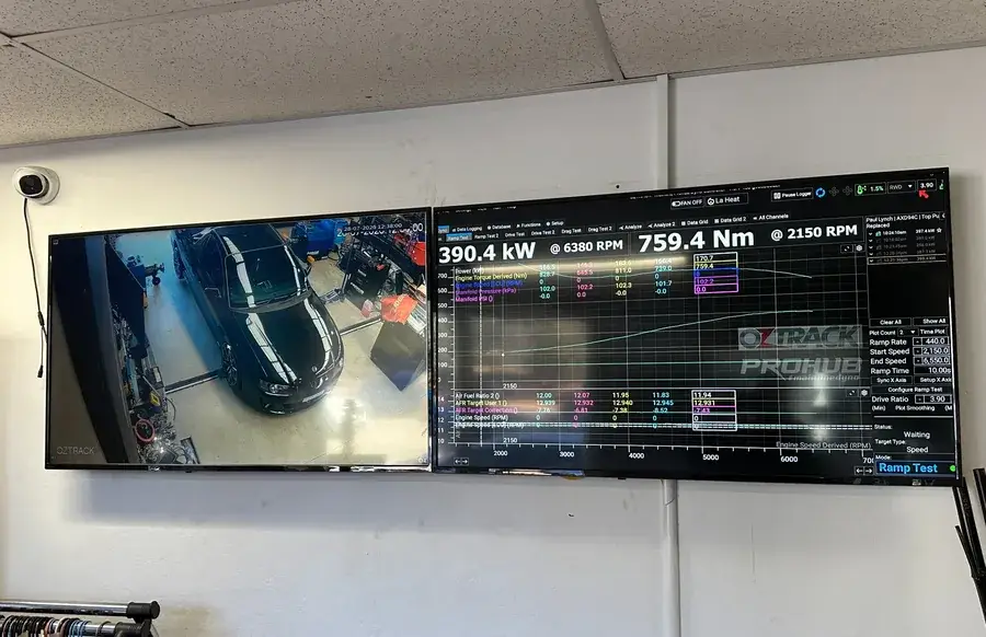 Customers can watch their vehicle being tuned live on two large TV screens at Oztrack